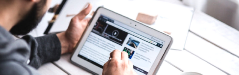 man watching video on tablet