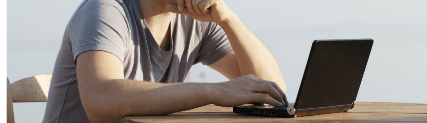 A man sitting at a computer